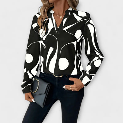Elegante blusa con maniche lunghe e scollo a V