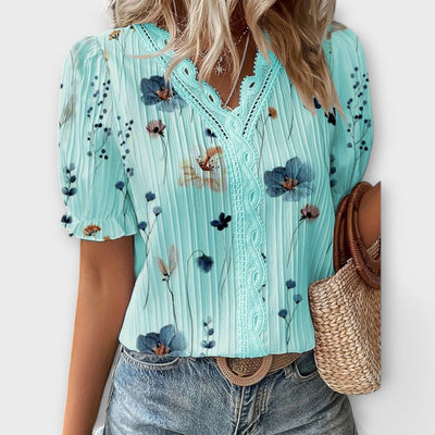 Emily - Blusa elegante con scollo a V