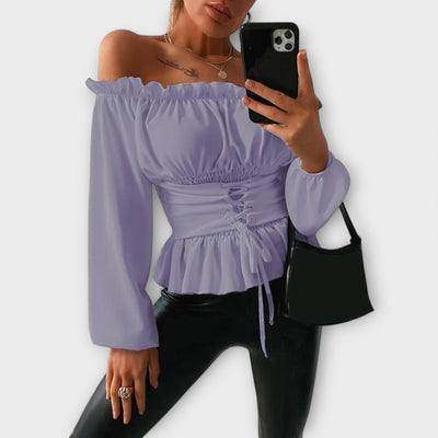 Amelia - Blusa con volant