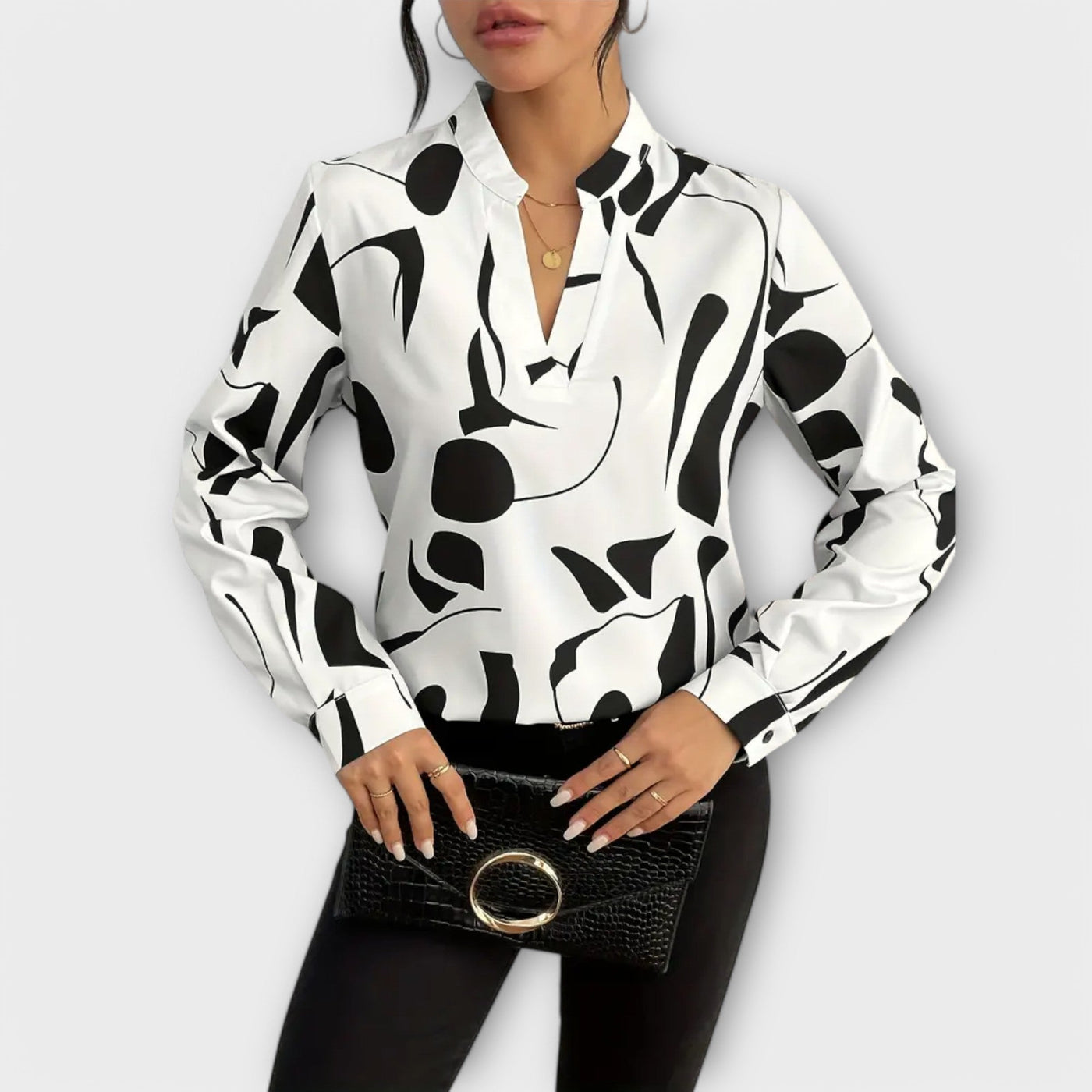 Elegante blusa con maniche lunghe e scollo a V