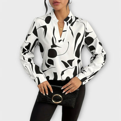 Elegante blusa con maniche lunghe e scollo a V